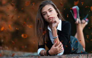 Woman brick wall cellphone autumn - artur tarnowski free wallpaper