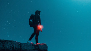 Futuristic man astronaut planet night - a flashlight free wallpaper for desktop