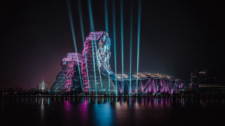 Night cityscape ferriswheel skyscraper abstract - a large building free wallpaper