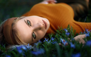 Woman lying flower field blue - wide free wallpaper for desktop