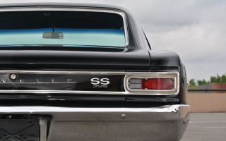 Black car chrome license sky - a black car free wallpaper for desktop