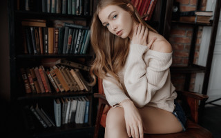 Woman sitting library book shelf - a book shelf free wallpaper