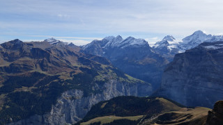 Mountain range snow capped clouds - claire falkenstein free wallpaper
