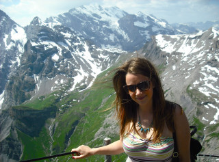 Woman sunglasses mountain range snow - claire falkenstein free wallpaper