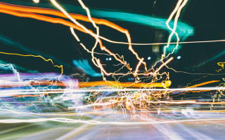 Blurry street clocktower motionblur citylights - the background and a building in the background free wallpaper