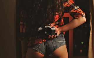 Woman shorts camera posing denim - photographic free wallpaper