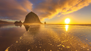 Sunset beach rock formation waves - a few wave free wallpaper