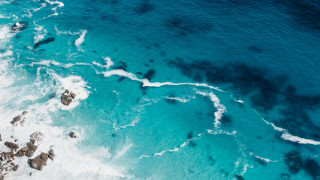 Ocean cliff wave impressionist bubble - a cliff face free wallpaper