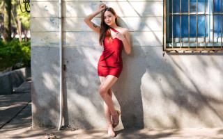 Woman red dress leaning wall - a red dress leaning against a wall free wallpaper