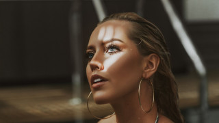 Woman hoop earrings white shirt - perfect free wallpaper