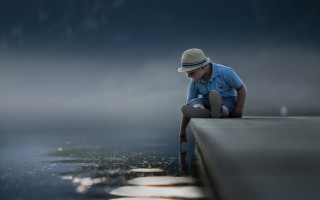 Man sitting ledge hat reflective - a ledge free wallpaper