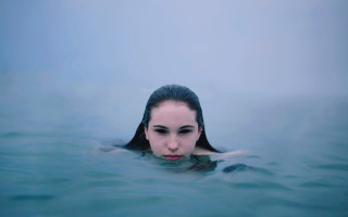 Woman swimming black headband photorealistic - a black hair free wallpaper
