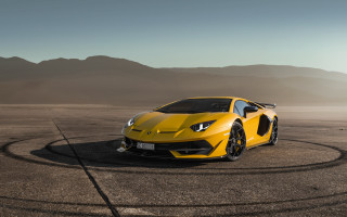 Yellow sports car desert mountains 3 - a desert area free wallpaper