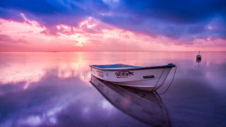 Sunset boat water mountain horizon - moody free wallpaper