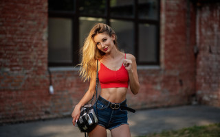 Woman red top denim shorts 3 - a polaroid photo free wallpaper