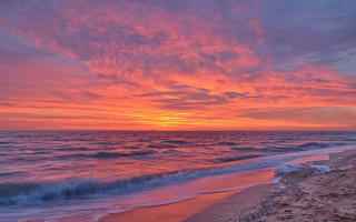 Sunset ocean beach wave person - colorful cloud free wallpaper