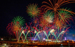 Fireworks city bridge night sky - free new year wallpaper