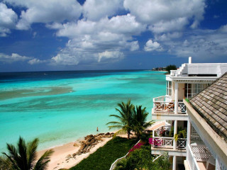 Beach balcony ocean palm trees - a view of a beach free wallpaper