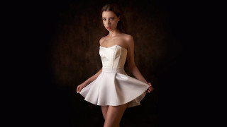 Woman white dress portrait brown - a black backdrop free wallpaper