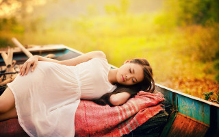 Woman boat water smile autumn - araceli gilbert free wallpaper