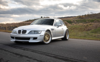 White car hillside 3d render - a white car free wallpaper