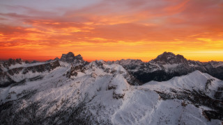 Sunset mountain range plane clouds - a plane free wallpaper for desktop