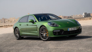 Green porsche panamera cityscape 3d - a parking lot free wallpaper