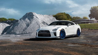 White sports car parking lot 23 - a parking lot next free wallpaper