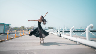 Woman dancing pier black dress - canon eos r 3 free wallpaper