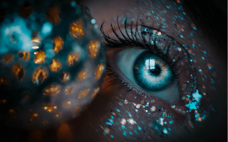 Eye blue eyeliner glitter photorealistic - a close up of a persons eye free wallpaper