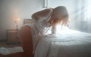 Woman lying bed white lingerie 2 - artur tarnowski free wallpaper