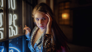 Woman wall clock neon portrait - a woman leaning against a wall free wallpaper