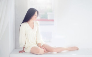 Woman sitting window sill white - a white room free wallpaper
