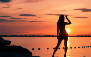Woman rock water sunset silhouette - the background and the water free wallpaper