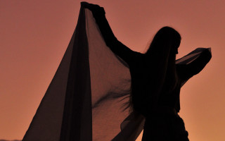 Woman scarf outstretched sunset silhouette - a white scarf free wallpaper