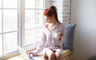 Woman sitting window sill coffee - a laptop computer free wallpaper