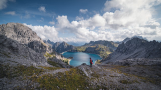 Mountain top lake cloudy sky - a lake below free wallpaper