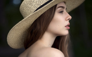 Woman hat longhair serious portrait - a long hair free wallpaper