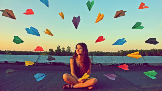 Woman sitting colorful umbrellas surreal - surreal free wallpaper