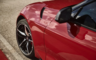 Red sports car open door - its door open free wallpaper