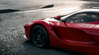 Red sports car cobblestone street 5 - side profile free wallpaper