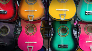 Colorful guitars store display tilt - a group free wallpaper