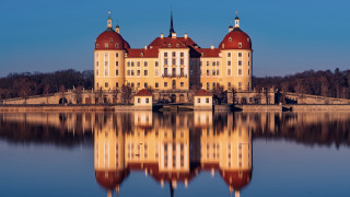 Romantic german architecture tower cityscape - a boat in front free wallpaper