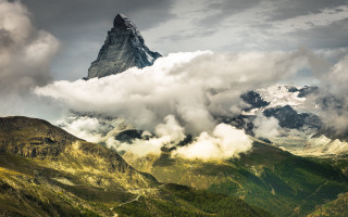 Mountain peak clouds valley trees - the cloud above free wallpaper