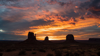 Sunset desert rock formation clouds - widescreen free wallpaper for desktop