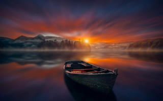 Boat water mountain sunset mystical - sunset time free wallpaper