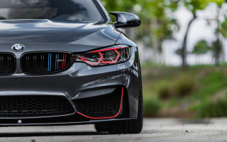Car street trees blurry depth - a close up of a car free wallpaper