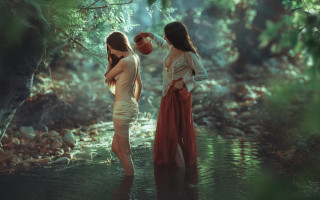 Two women stream woods holding - a stream free wallpaper
