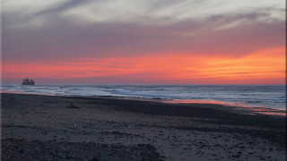 Sunset boat ocean beach sky - a few footprint free wallpaper