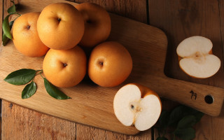 Cutting board apples oranges leaves - a cutting board free wallpaper
